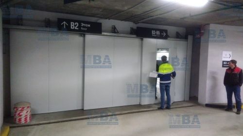 трёхстворчатые откатные огнестойкие ворота на паркинге башня око Москва-Сити